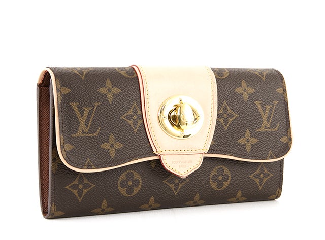 This is an authentic Louis Vuitton Boetie wallet. It is done in the traditional monogram canvas and trimmed in gorgeous vachetta leather. There is a bright vachetta strip that covers the center of the flap where the golden turnlock closure is.