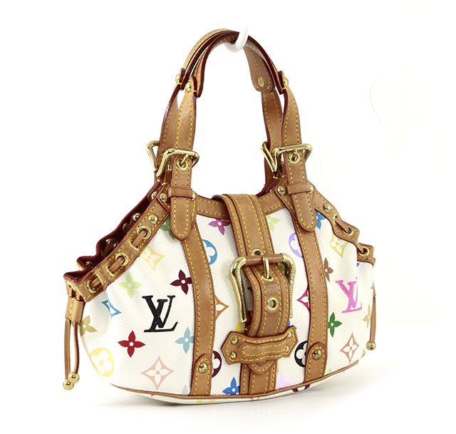This is an authentic Louis Vuitton bag! Done in fun multicolor monogram canvas, trimmed with vachetta leather, this bag is a tiny statement piece! The details are what makes this bag special:the almost triangular shape, the gathered sides, and the