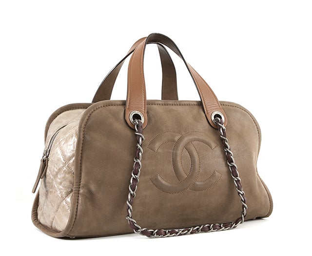 This is an authentic Chanel bag. This bag is made from soft beige velvet leather as well as a lighter toned quilted lambskin. The interlocking CC's are stitched into the soft leather on the front of the bag. This unique bag features both flat tan