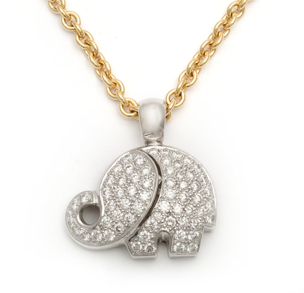 Elephant diamond pendant featuring 67 round diamonds weighing 2.17 carats on an 18kt yellow gold chain.  
Color G
Clarity VS-SI