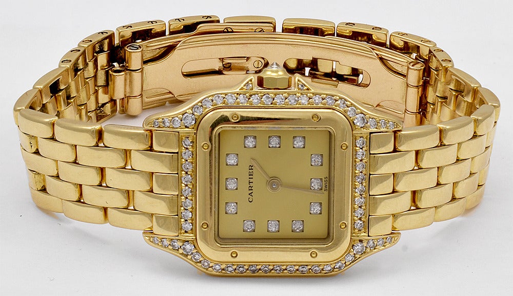 Cartier lady's 18k yellow gold Panthere wristwatch with factory-original diamonds, featuring 12 diamonds on the dial and 62 diamonds on the case. Very rare example to find!