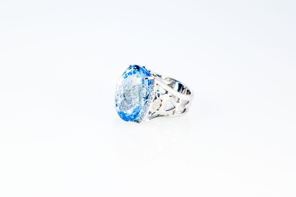 52.0 carat London Blue Topaz Ring featuring 0.78 carats of F-VS Diamond and 23.5 grams of 18K White Gold