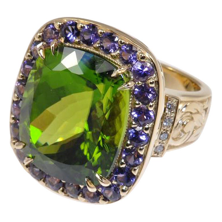 24.0 carat Pakistani Peridot & Purple Sapphire Ring For Sale
