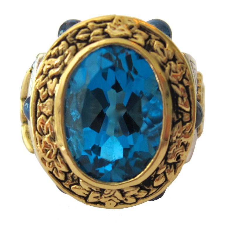 Six Carat Blue Topaz Multicolored Sapphire Gold Aleluya Ring