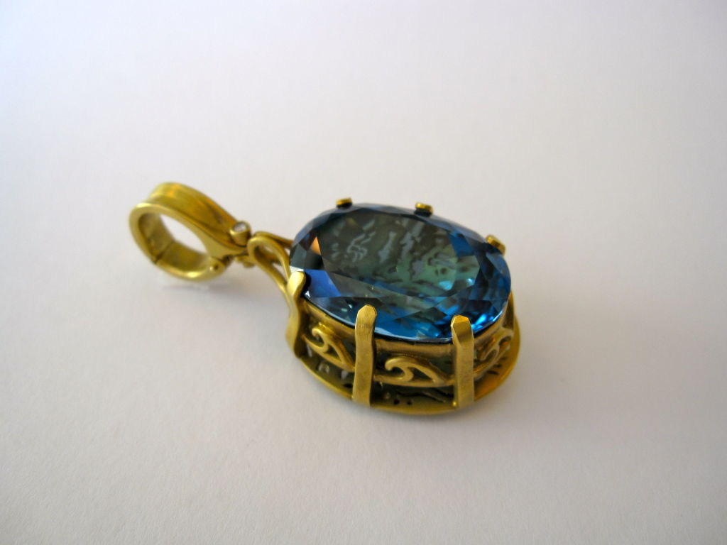 Stunning 40 Carat London Blue Topaz Gold Hand-Carved Pendant For Sale 2