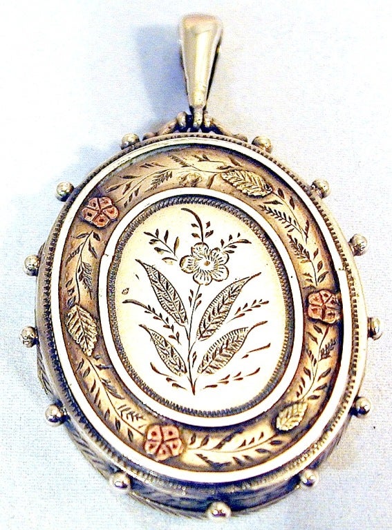 This lovely locket has a surprise. The reverse side has an amazing engraving of the South Cliff Tramway, Scarborough. It was the first funicular railway in the United Kingdom and opened in 1875.