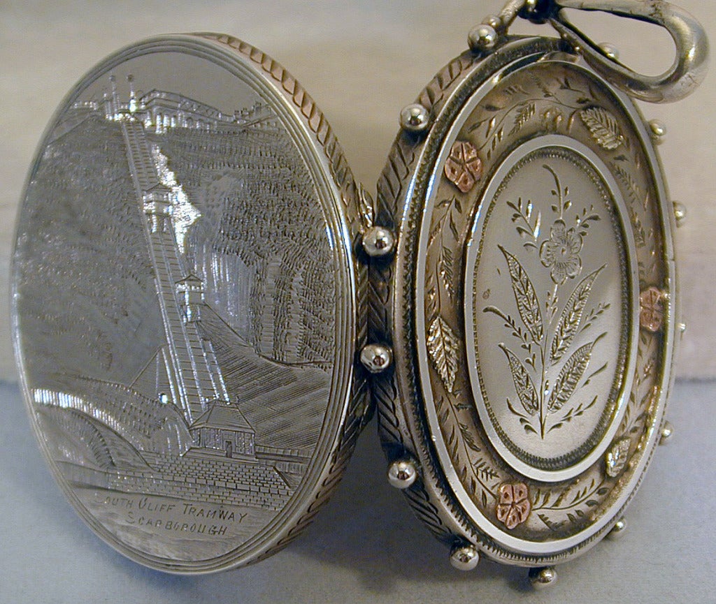 Antique Silver Locket Embellished with Gold 3