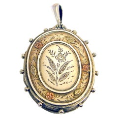 Antique Silver Locket Embellished with Gold