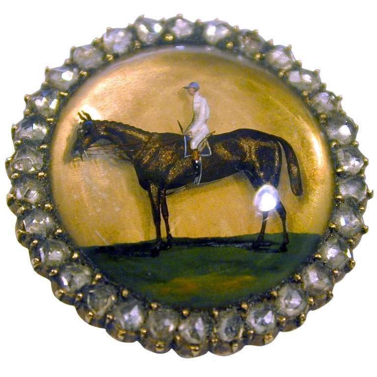 Antiguo broche de cristal de Essex con caballo y jinete