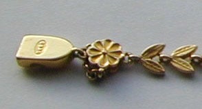 Carlo and Arthur Giuliano 18K bracelet of foliate and floral designs. This unusual piece is signed C and AG and is circa 1900. The bracelet is 7 3/8