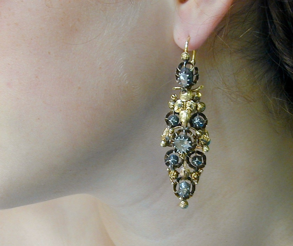 Traditional jewellery often follows older aristocratic examples and many Spanish traditional earrings were based on 17th & 18th century patterns.  Set in 15K gold and silver, fashioned in the Iberian style popular in Spain in the late eighteenth