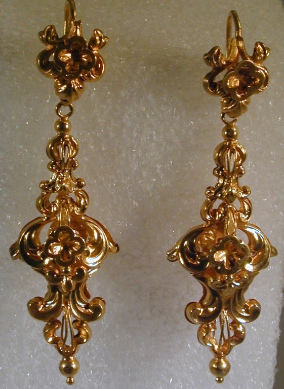 Fantastic 18K yellow gold ornate drop earrings. Also called day-night earrings. The drops, worn at formal evening events, can be easily removed from their hooks and the tops worn alone at afternoon teas.