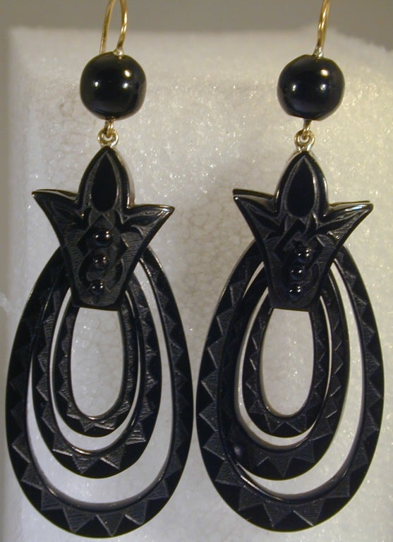 Dramatic large triple hoop jet earrings hand engraved with geometric designs.  Perfect with today's fashions.