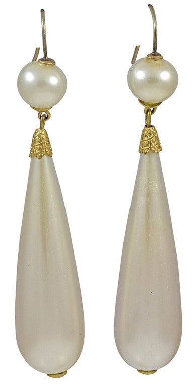 Elegant Georgian pendeloque shaped earrings of faux pearl and pinchbeck. These beautiful earrings can be worn day or night. 

Faux pearl is blown glass with an inner coating of nacre which is a paste made from fish scales. Pinchbeck, named for its