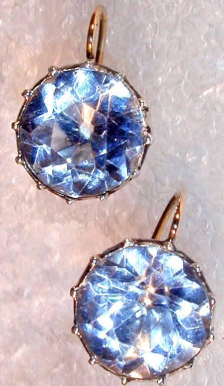 Georgian paste earrings set in a silver "pie crust" mounting with 15K earwires can be worn day and night.