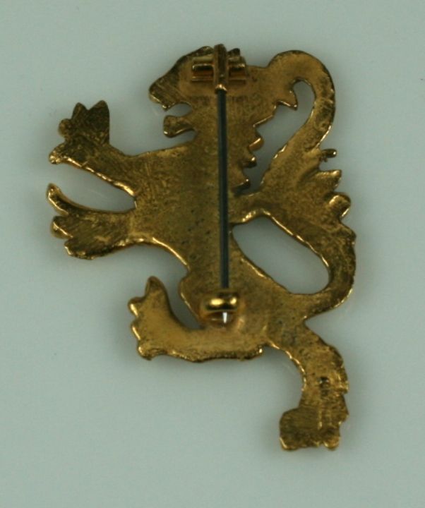 chanel lion brooch