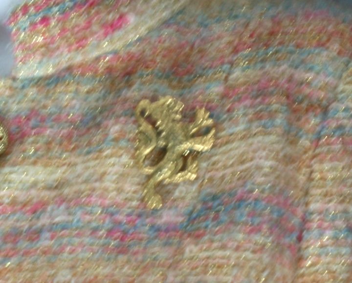 chanel lion brooch