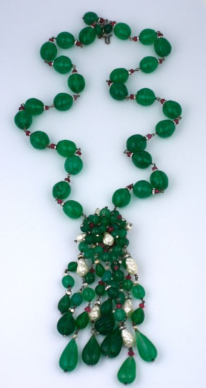 Impressive Chanel moghul styled sautoir which can be worn in several ways. This cluster bead clip/necklace of fluted and smooth emeralds, rubies, and pearls has been perfectly replicated by Gripoix in signature pate de verre. In a time staking
