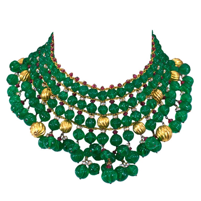 Chanel's multicultural embrace of all things luxurious and beautiful crossed continents, cultures and time. The splendors and colors of the royal Indian courts inspire this stunning bib necklace, rendered by studio Gripoix.<br />
 Hundreds of