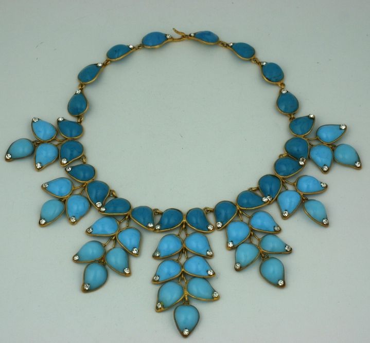 Unusual Chanel leaf formed bib in the Moghul taste made with 2 tones of turquoise pate de verre. A darker shade lines the neckline while the persian turquoises accentuate the leafy tendrils. Tiny pastes accent the points of the leaves for effect.