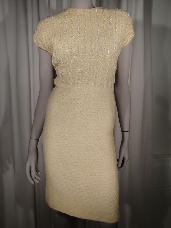 I. Magnin cream wool dress embellished with pearls and iridescent sequins,back zipper and fully lined.