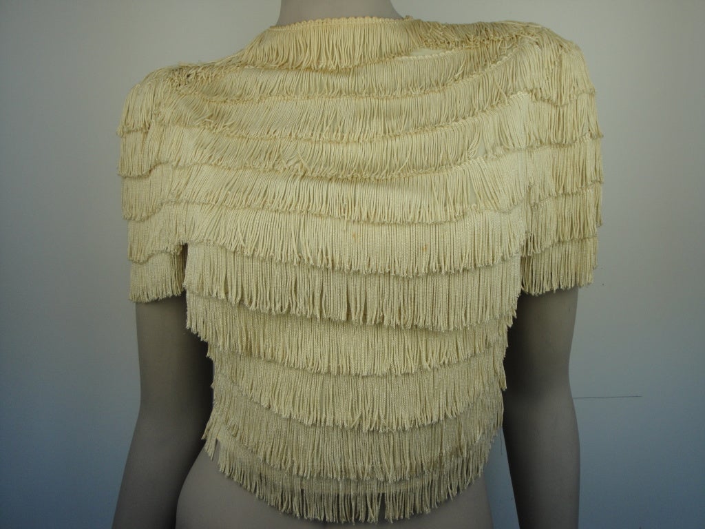 1960's fringe cropped top with back zipper.