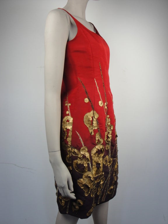 Oscar De la Renta red silk cocktail dress with gold embroidery,back zipper and fully lined in silk. Circa 2008 Fall
