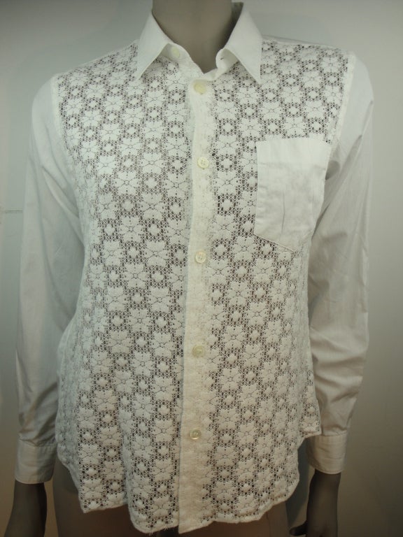 Comme des garcons white cotton button down shirt with knit front and one pocket.