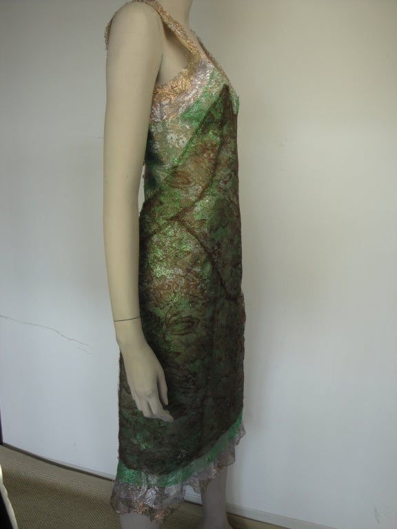 Zac Posen multi layered iridescent lace dress with covered button back and fully lined.