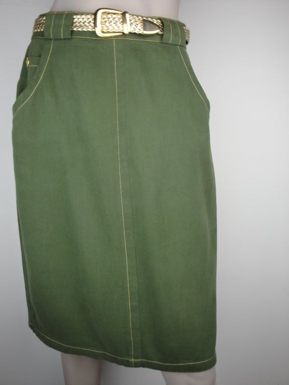 Givenchy olive green pencil skirt,two front pockets,one studded back pocket and gold braided leather belt.

Label Givenchy circa 1980