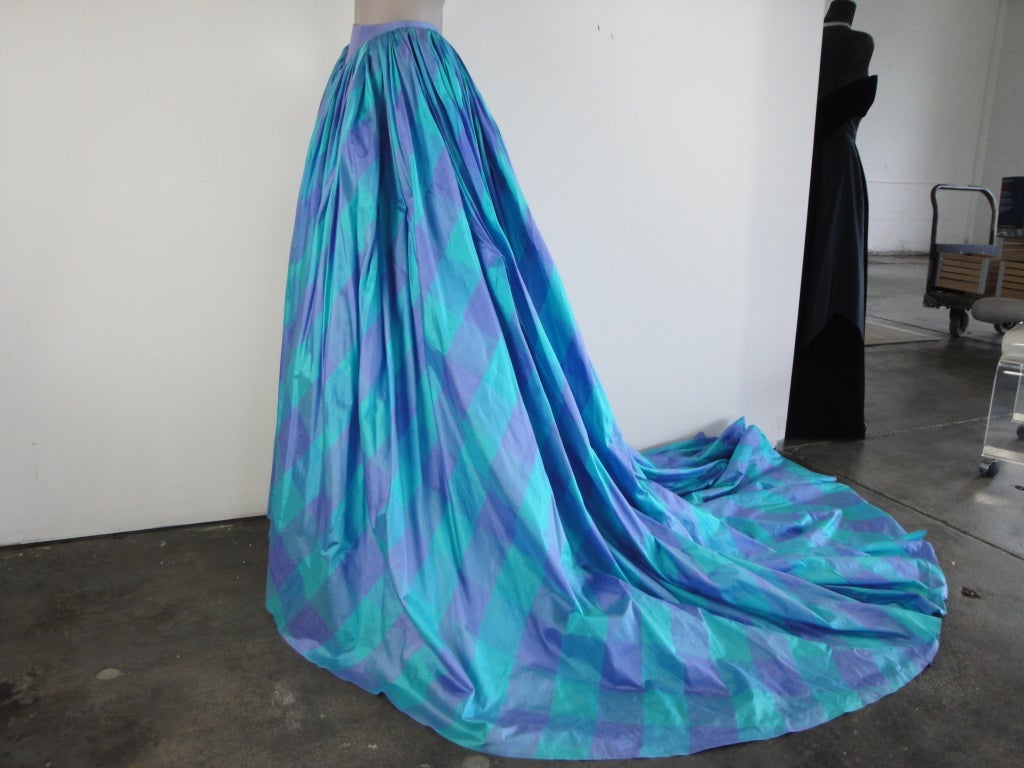 Isaac Mizrahi silk full skirt,back zipper and interesting ties that can give the skirt a bustle back.(See photos)