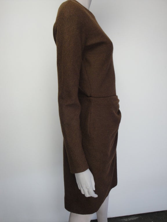 Donna Karan aplaca wool jersey chocolate brown wool  dress, back zipper and fully lined.

No Size Label
Bust 34, Waist 27, Hips 31, Length 38.5