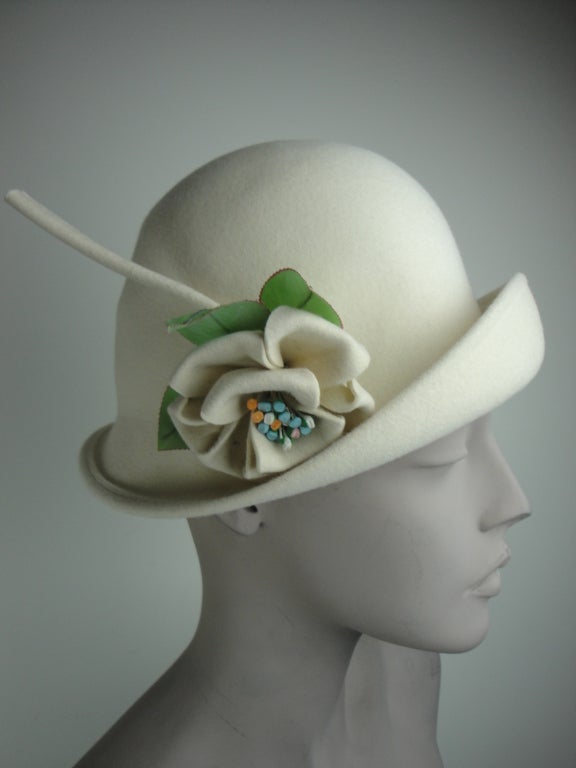 Adolfo ivory wool felt hat with wool felt flower. 
21 inch circumference
