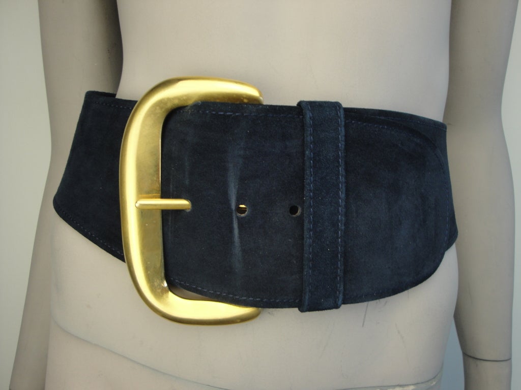 Robert Lee Morris for Donna Karan navy blue suede wide belt with gold tone buckle.