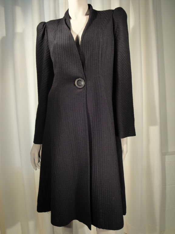 1940's Topcoat in lighter weight wool, fully lined with fitted waist, one button , full sleeves and shoulder pads.