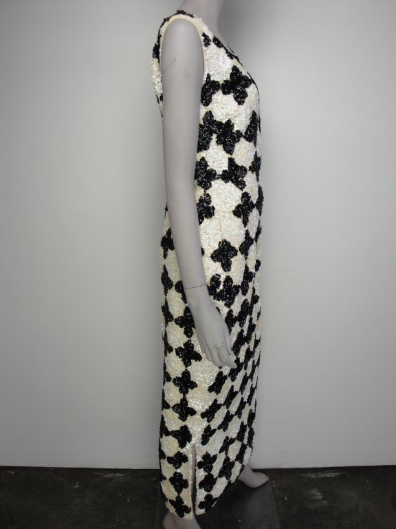 1960's black/cream wool sequined sleeveless dress,side slits and back zipper.