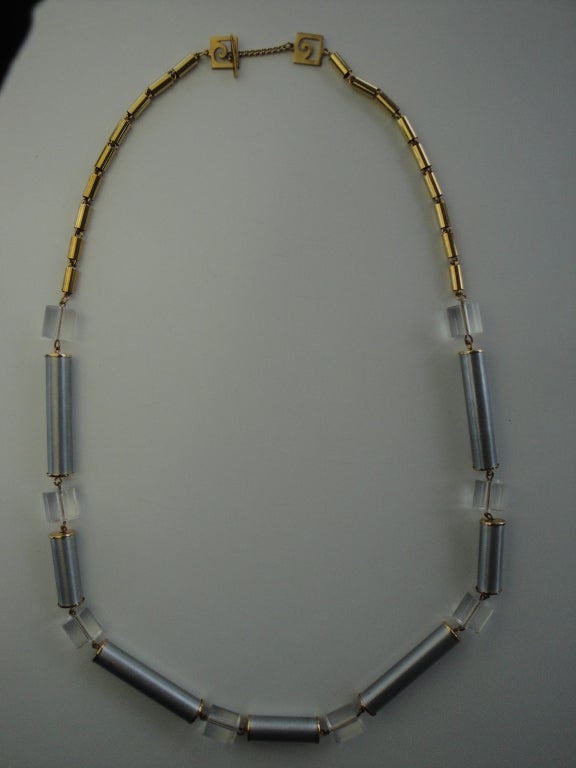 Pierre Cardin lucite, aluminum and gold tone necklace.