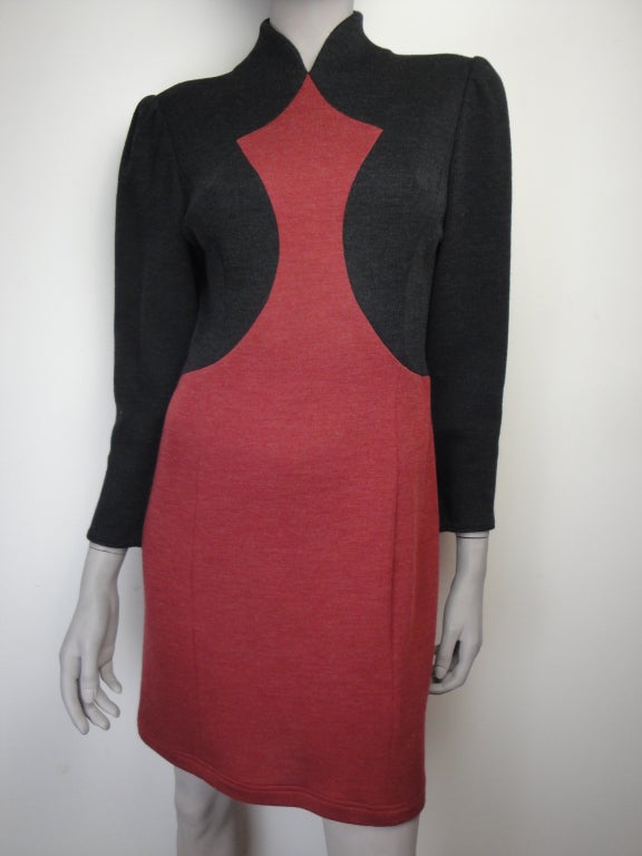 Emanuel Ungaro black and rust long sleeve color-block dress with back zipper.