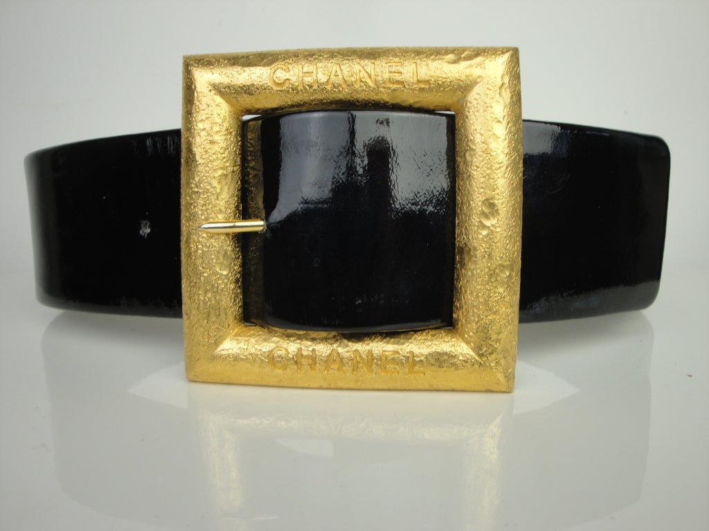 Chanel circa 1993 black patent belt with gold-tone buckle.
2inch wide-30inch long