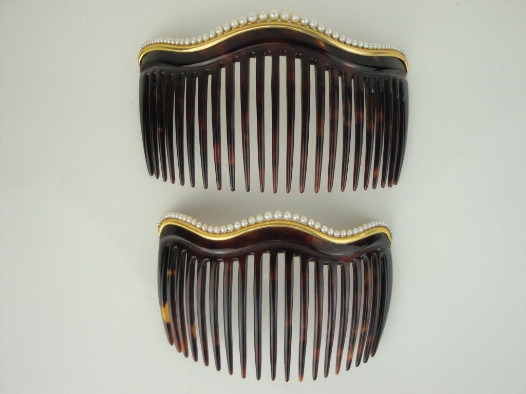 Pair of tortoise hair combs with 14k gold and pearls.