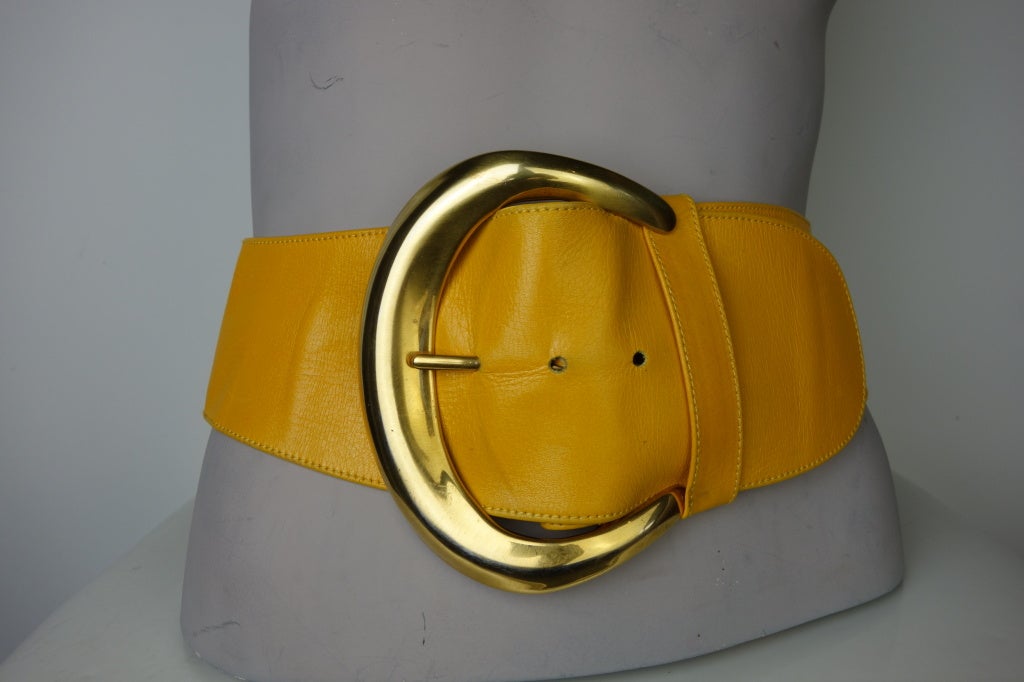 Donna Karan 1980's gold leather belt with large gold-tone buckle designed by Robert Lee Morris.