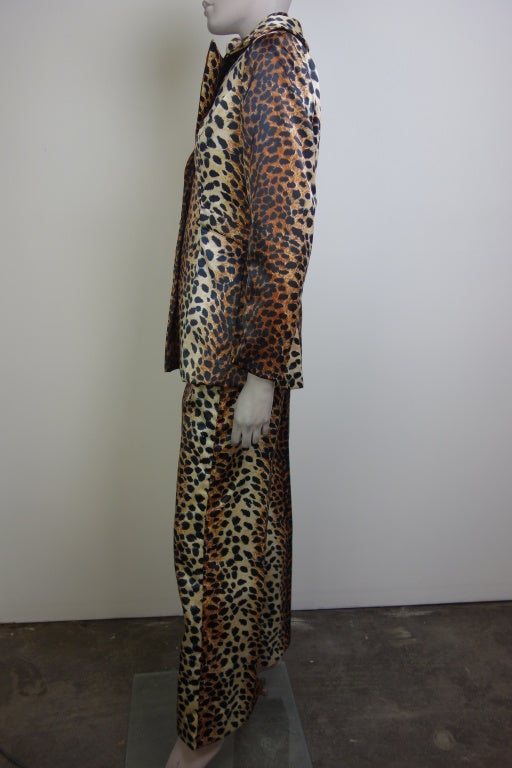 Lilli ann four piece suit. Jacket,pant,skirt and top with attached leopard scarf.