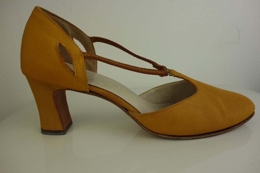 Schiaparelli gold low heel shoe.