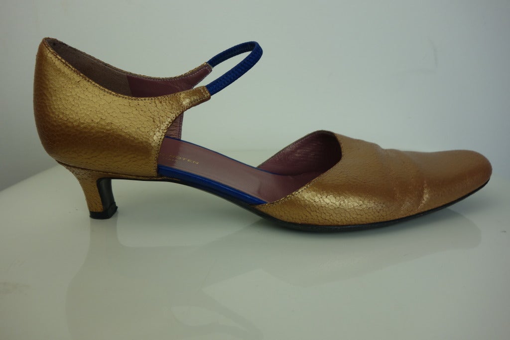 Dries van Noten gold and blue low heel shoe.