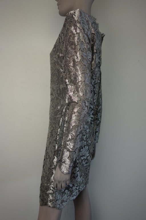 Calvin Klein silver metal lace dress with back zip and fully lined.