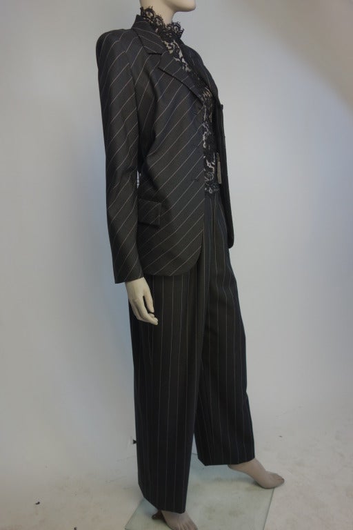Bill Blass 1980s 4 piece ensemble. Charcoal grey pinstripe suit with lace top and cotton stripe sweater.