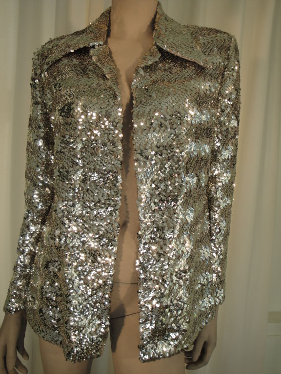 Silver sequined shirt style jacket with wide lapels.