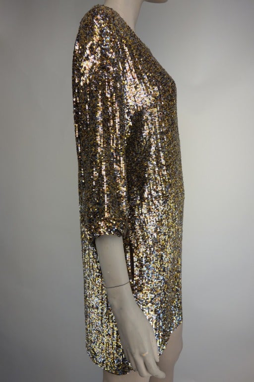 Philip Lim black, gold, copper, and silver sequin dress with two front pockets and fully lined in silk chiffon.