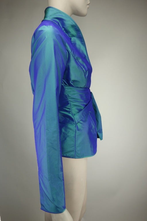 Etro iridescent blouse with front tie closure at waist and collar.