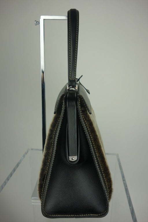Delvaux Handbag with Four Interchangeable Sleeves at 1stdibs